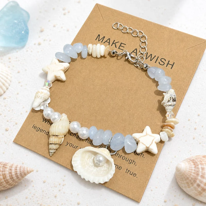 ocean-beach-seashell-starfish-beade_1320_9meh.webp