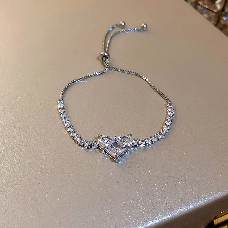 Silver-Tone Sparkling Crystal Heart Tennis Bolo Br - Product Image